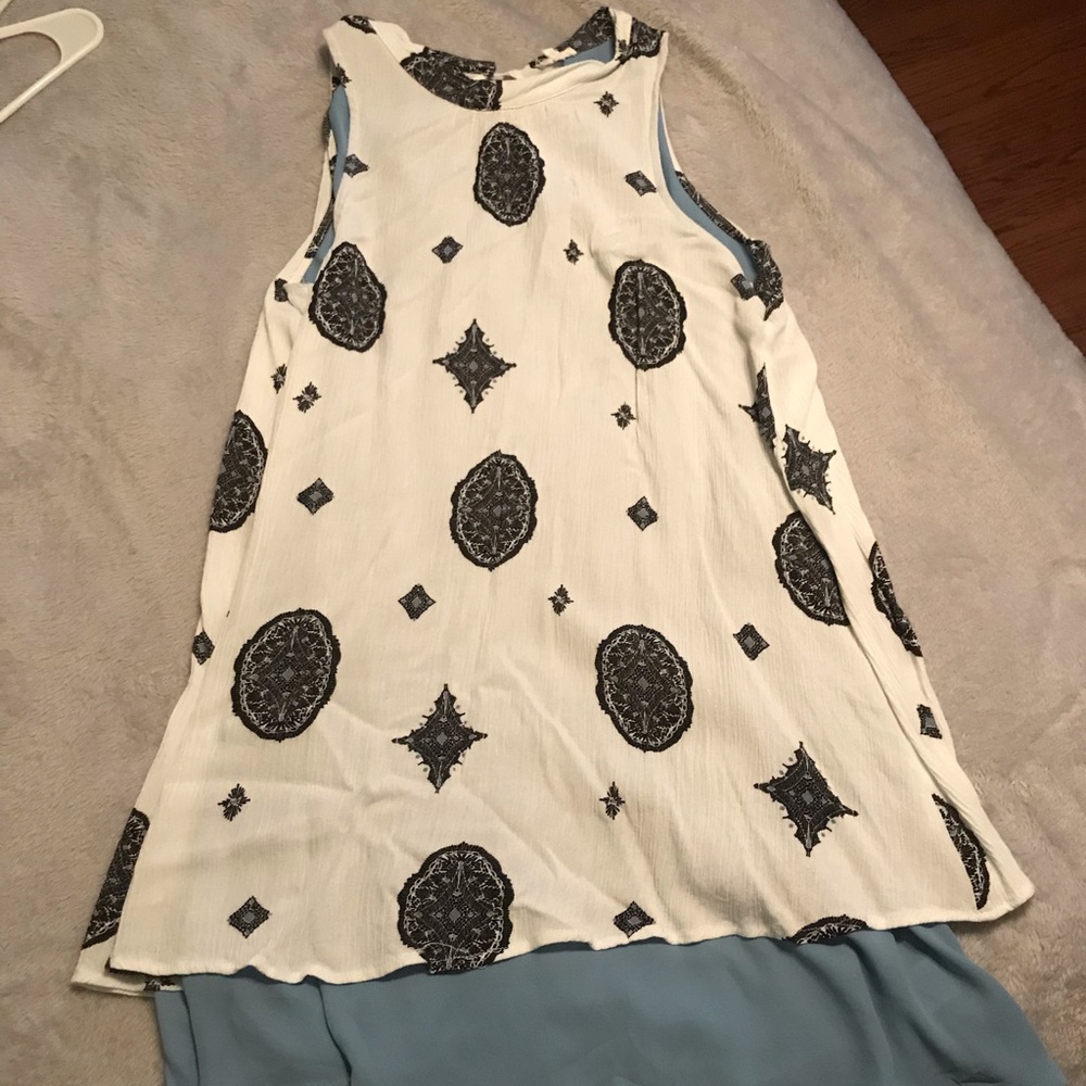 White and blue pattered halter dress